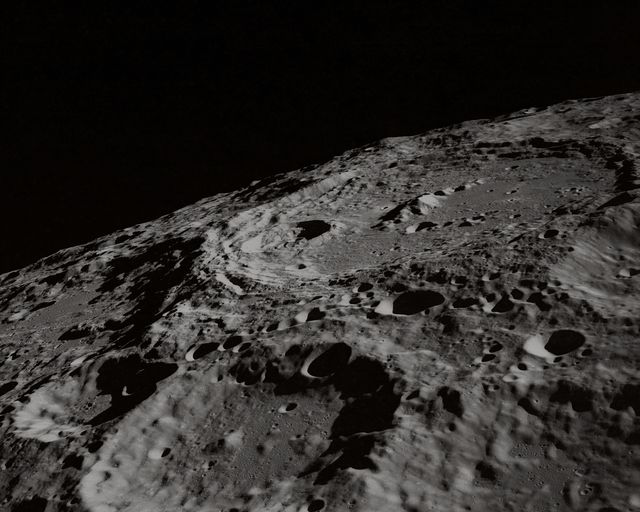 Perfect for astronomy enthusiasts or space-related projects, this detailed black and white depiction shows the cratered surface of the moon. Ideal for educational materials, science articles, space exploration presentations, or adding a celestial theme to backgrounds and scenery elements in design projects.