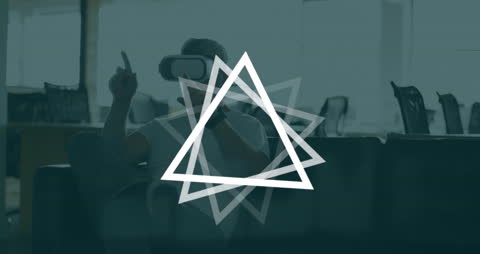 Caucasian Man Experiencing Virtual Reality in Office