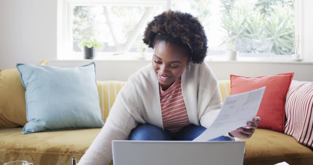 Young African American Woman Working from Home on Laptop - Download Free Stock Images Pikwizard.com