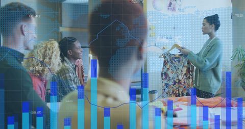 Creative Team Analyzing Fashion Trends with Digital Data Overlay