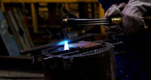 Skilled Worker Using Torch for Metal Fabrication in Workshop - Download Free Stock Images Pikwizard.com