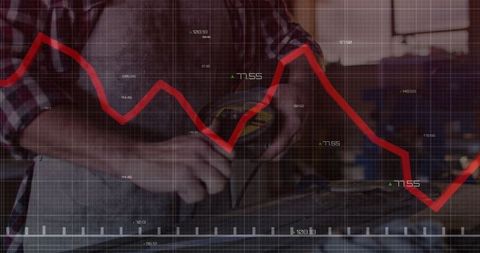 Craftsman in woodshop using digital caliper with data overlay