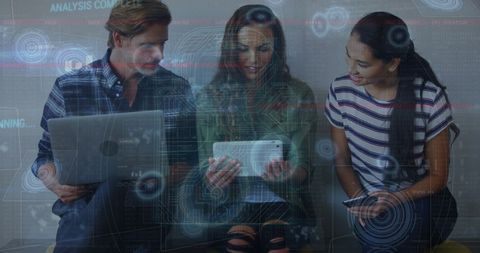 Diverse Team Discussing Data on Digital Interface - Download Free Stock Images Pikwizard.com