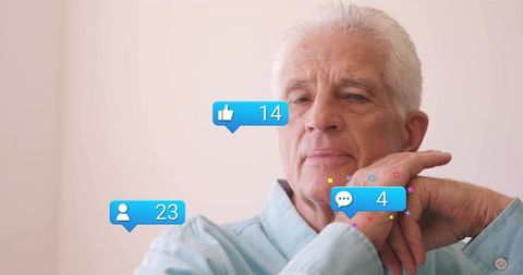 Senior man contemplating with social media notification badges floating, minimalist portrait