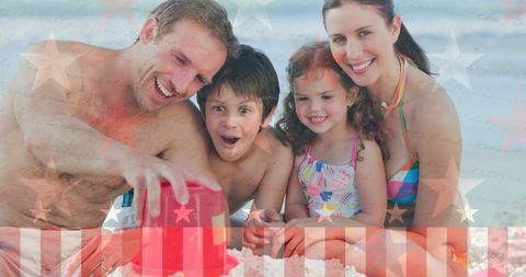 Patriotic family enjoying beach day with usa flag overlay