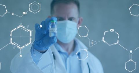 Doctor Holding Vaccine Amid Chemical Structures Indicates Medical Innovation