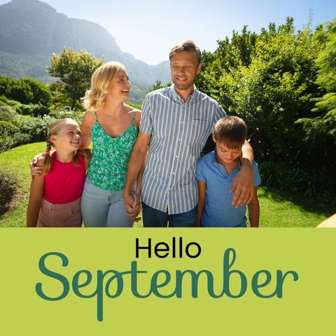 Happy family celebrating beginning of september in garden