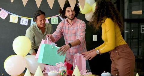 Colleagues Preparing for Office Baby Shower Celebration