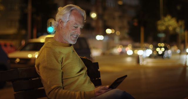 Senior Man Using Tablet on Park Bench at Night - Download Free Stock Images Pikwizard.com