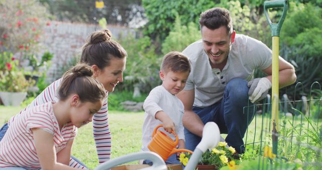 Family Gardening Together on a Sunny Day - Download Free Stock Images Pikwizard.com