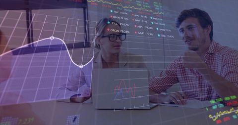 Young Professionals Analyzing Digital Financial Graphs in Modern Office - Download Free Stock Images Pikwizard.com
