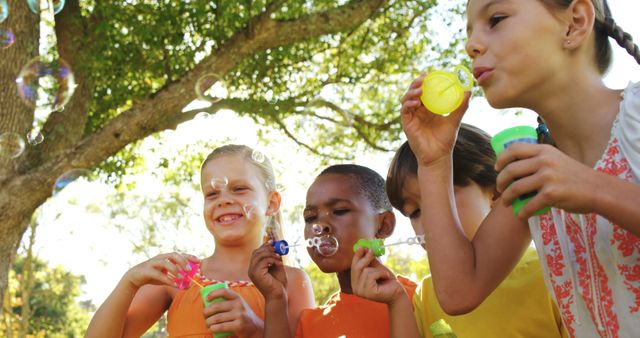 Diverse Children Blowing Bubbles Outdoors on a Sunny Day - Download Free Stock Images Pikwizard.com