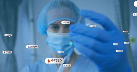 Medical professional analyzing capsule in laboratory