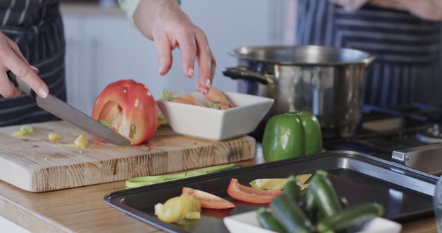 Middle-aged Woman Preparing Fresh Vegetables in Kitchen - Download Free Stock Images Pikwizard.com