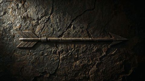Ancient arrow on cracked stone illustrating historical craftsmanship