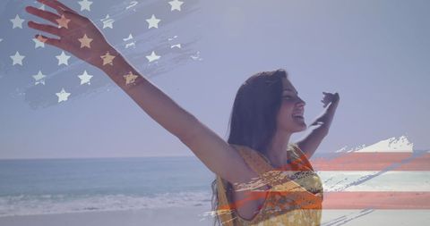 Joyful Woman Embraces Freedom and Patriotic Spirit at Beach