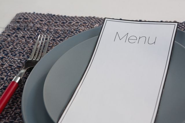 Close-up of menu card on table setting