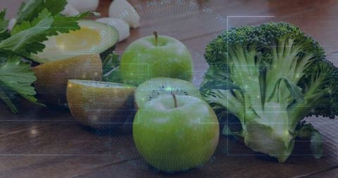 Green produce blending with digital health hud overlay on wooden table for nutrition tech