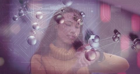 Woman engaging with futuristic holographic molecular display