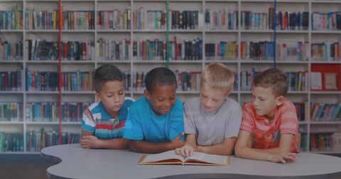 Children Reading Together Enthusiastically in School Library