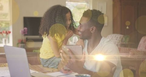 Father and Daughter Bonding Over Tablet in Cozy Living Room