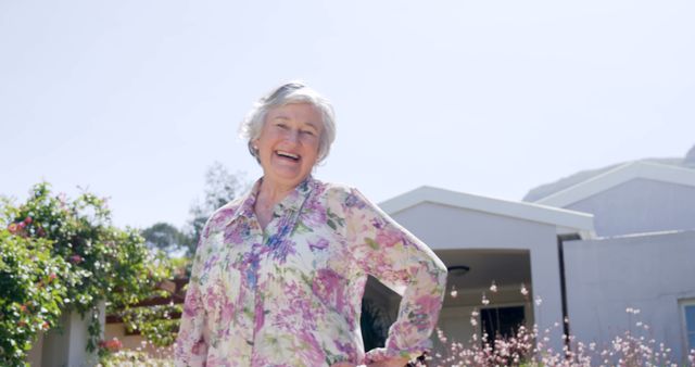 Happy Senior Woman Smiling Outdoors in Front of Home - Download Free Stock Images Pikwizard.com