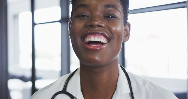 Smiling African American Female Doctor in Hospital with Stethoscope - Download Free Stock Images Pikwizard.com