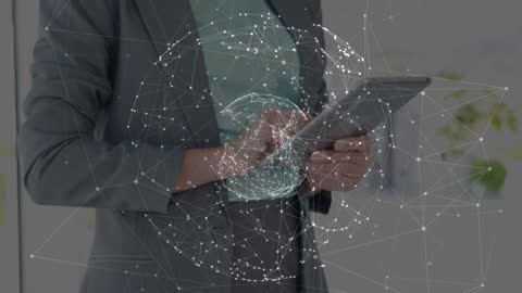 Businesswoman Using Tablet with Global Network Hologram