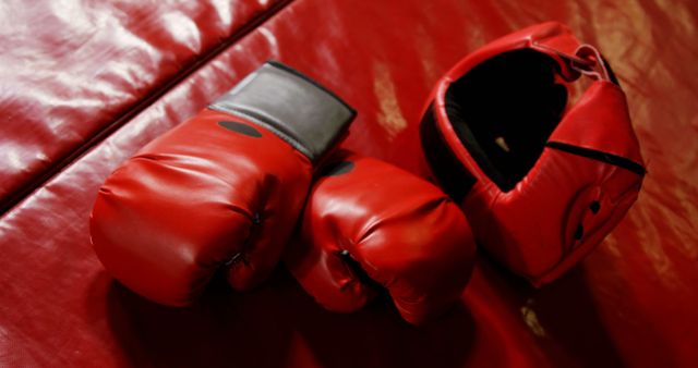Red Boxing Gloves and Helmet on Red Mat - Download Free Stock Images Pikwizard.com