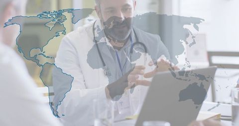 Doctor consulting patient via laptop with world map overlay for global telemedicine
