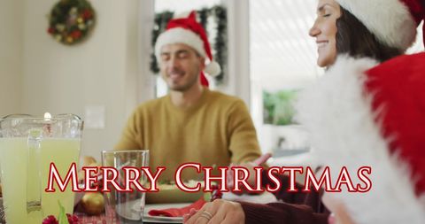 Family celebrating christmas blessing before festive meal