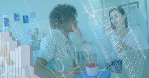 Diverse Business Team Discussing Financial Data Visualization