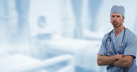 Confident Male Doctor Working in Modern Hospital Setting