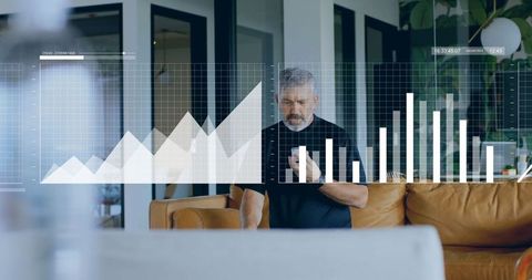 Senior Man Analyzing Holographic Data Bar Charts in Modern Home
