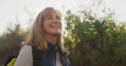 Senior Woman Smiling in Nature During Hike - Download Free Stock Images Pikwizard.com