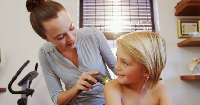 Female Therapist Using Ultrasound Therapy on Smiling Boy Indoors - Download Free Stock Images Pikwizard.com