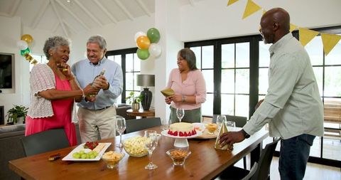 Senior Friends Celebrating a Joyful Birthday Party