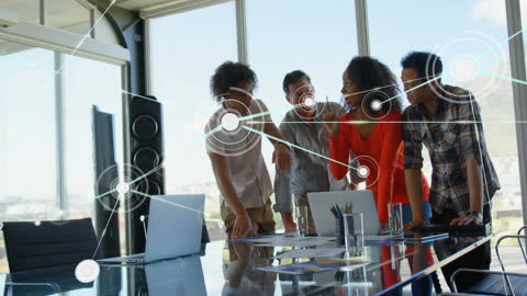 Collaborative Team Using Digital Network in Modern Office