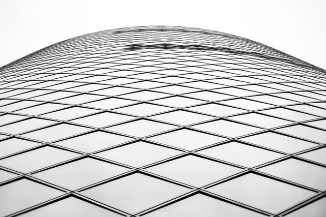 Low Angle Shot Architectural Building in Grayscale Photo - Download Free Stock Photos Pikwizard.com