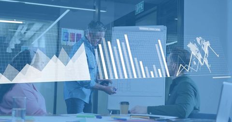 Business team presenting data dashboards and analytics during collaborative modern meeting