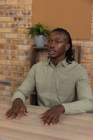 Business Professional Engaged in Discussion in Modern Office