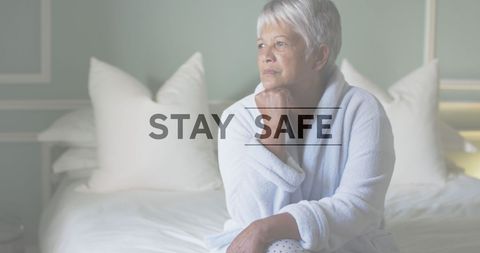 Thoughtful Senior Woman at Home Emphasizing Safety