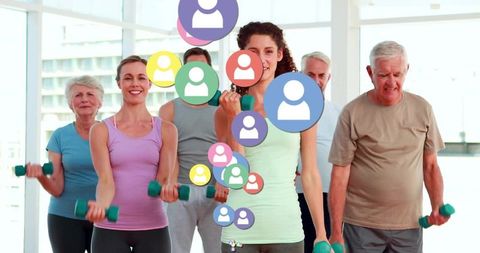 Diverse Group Performs Strength Training with Dumbbells