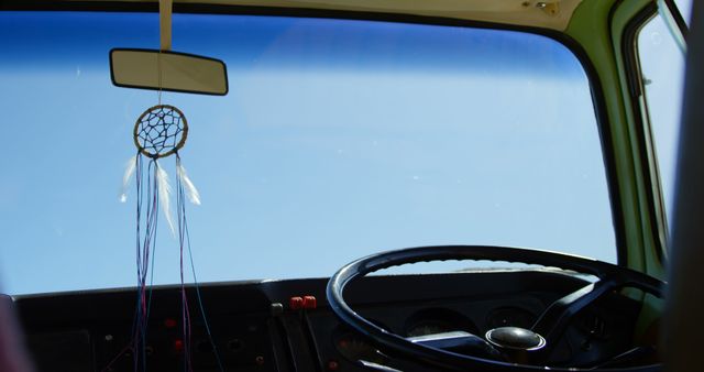 Dreamcatcher Hanging from Rearview Mirror Inside Vintage Van - Download Free Stock Images Pikwizard.com