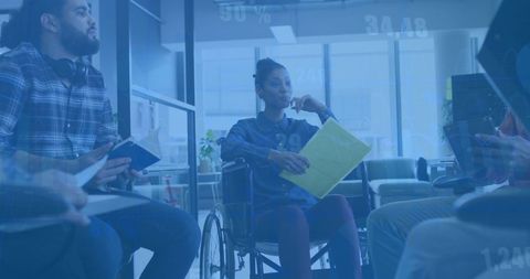 Diverse Team Analyzing Financial Data in Modish Office Space