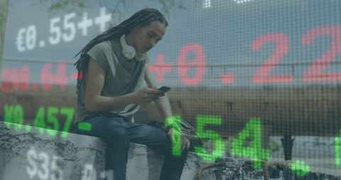 Young Urban Professional Using Smartphone with Stock Market Overlay