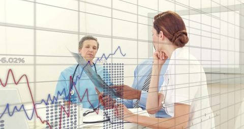 Medical Team Reviewing Patient Data with Digital Graphs and Charts During Clinical Meeting