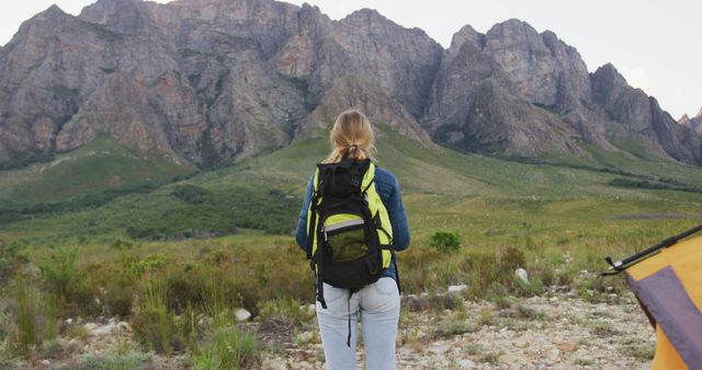 Woman Hiking with Backpack in Scenic Mountain Landscape - Download Free Stock Images Pikwizard.com