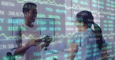 Diverse Coworkers Analyzing Financial Data Overlay