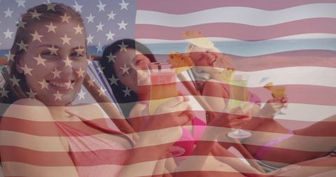 Women Celebrating Freedom on Beach with Cocktails